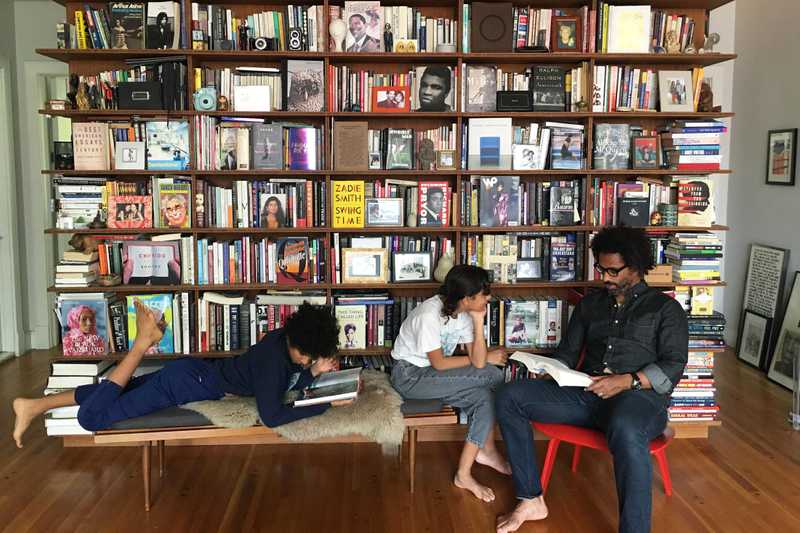 Toure reading with his children